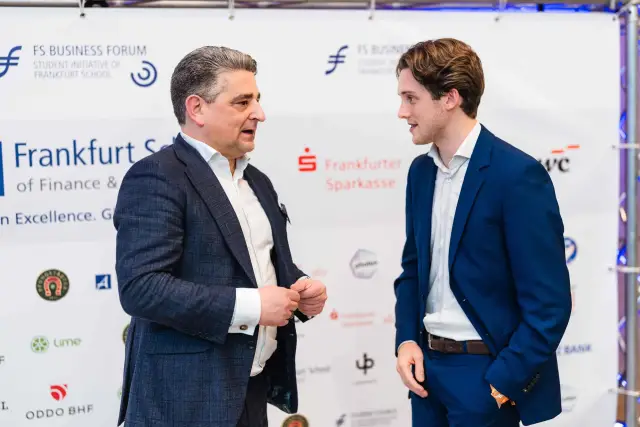 thyssenkrupp CEO Miguel Ángel López Borrego in conversation in front of the partner wall